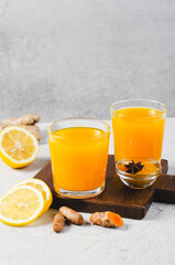 Turmeric Tea, Healthy Beverage with Turmeric Root and Spices, Jamu Juice, Immunity Booster Drink on...