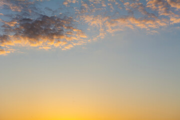 The setting sun illuminating the sky.