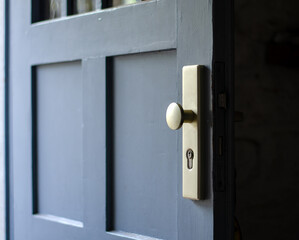 Door handle of the door to the basement close-up