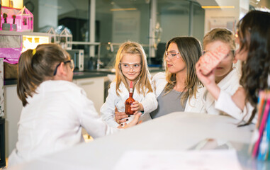 Kids in the school working on an experiment at the Science Lab