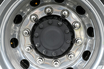 Truck tire and rim. Rim, close up. Car tire screws. Transportation concept.