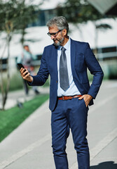 businessman man portrait business smart senior mature success confident office corporate elderly smartphone phone cell