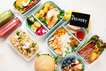 Restaurant healthy food delivery in take away boxes for daily nutrition on white background.