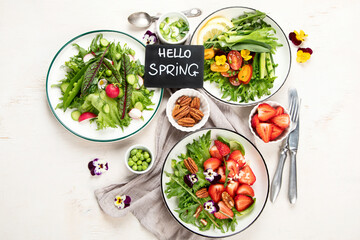 Various of spring vegetable salads. Tasty healthy food.