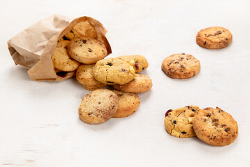 National Cookie Day with yummy freshly chocolate chip cookies on a white background. Top view.