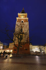 Fototapeta premium Nightime image of the Town Hall Tower, Market Square, Krakow, Poland, Europe.