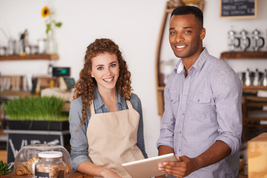 Cafe owners, tablet and portrait of people, training and coaching in store. Waiters, black man and happy woman in restaurant with technology for inventory, stock check and managing sales online.