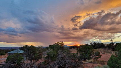 Thunderstorm rolling over the desert landscape at dusk near Moab, Utah