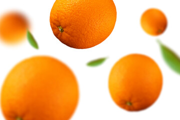 Flying defocusing oranges with green leaves. Falling juicy oranges isolated on transparent background