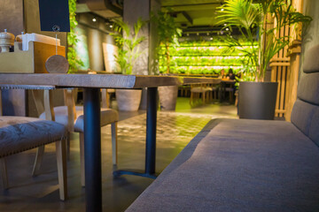 wooden table and interior in an expensive restaurant