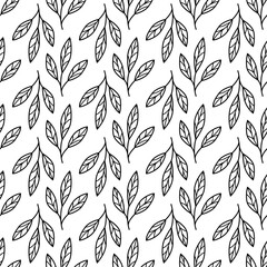 Hand drawn seamless pattern, twigs with leaves in the doodle style