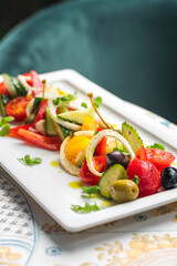 Salad with tomato, italian ricotta cheese and basil