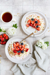 Homemade pellet with milk and strawberries. Prepared breakfast for the whole family in a ceramic plate. 