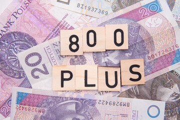 inscription 800 plus next to Polish money. Revaluation of the 500 plus program in Poland. Election...