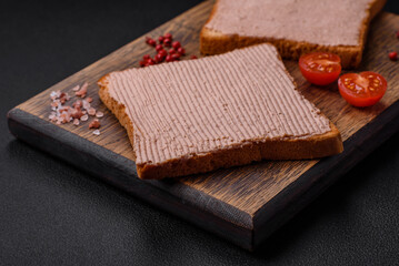 Delicious crispy toast with chicken or goose pate with salt and spices