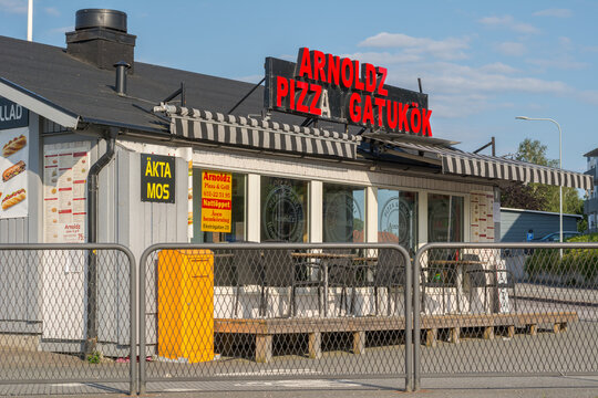 Gothenburg, Sweden - June 13, 2020: Small local pizzeria called Arnoldz with no customers during the corona pandemic on Hisingen in Gothenburg.