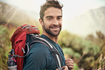 Hiking, adventure and portrait of man on mountain for fitness, relax and travel journey. Backpack,...