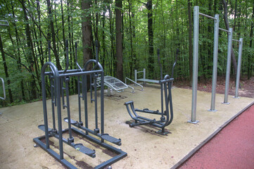 Fototapeta na wymiar empty playground in the park,workout in forest,gym in nature