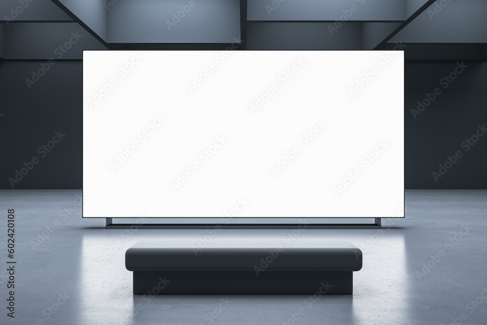 Poster Front view on blank white glowing screen with space for your advertising text or logo on dark wall background opposite bench in abstract presentation hall interior. 3D rendering, mockup