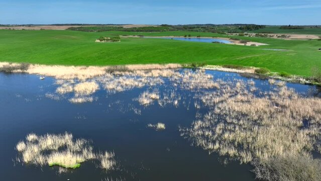 Aerial view of small lake in Warmia, northern Poland, Europe