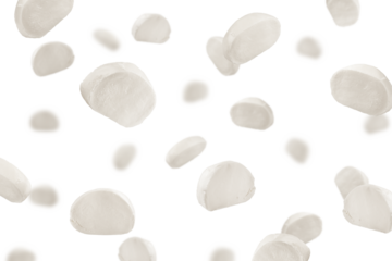 Falling Mozzarella cheese isolated on white background, selective focus
