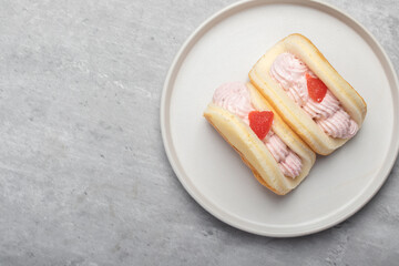 Strawberry pancakes on a white plate