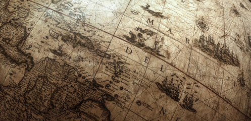 Fragment of an ancient globe. Old globe map background. A concept on the topic of sea voyages, discoveries, pirates, sailors, geography, travel and history.
