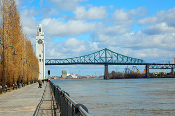 Jacques Cartier bridge and tower clock in Montreal in Canada