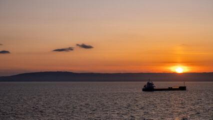 Fototapeta na wymiar Sunset from the seaside on
