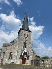Fototapeta na wymiar Clocher tors de l'église de Goé prés de Limbourg - Province de liège, Wallonie, Belgique