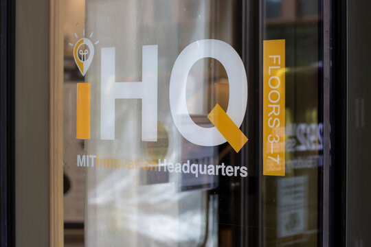 Cambridge, MA, USA - June 28, 2022: MIT Innovation Headquarters (iHQ) sign is seen the Suffolk Building, or Building E38, on the campus of the Massachusetts Institute of Technology.