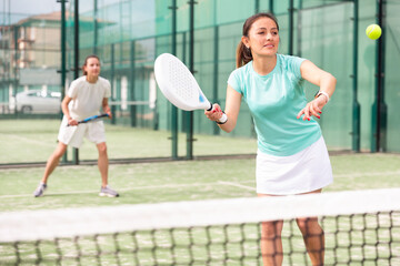 Team padel game on the tennis court