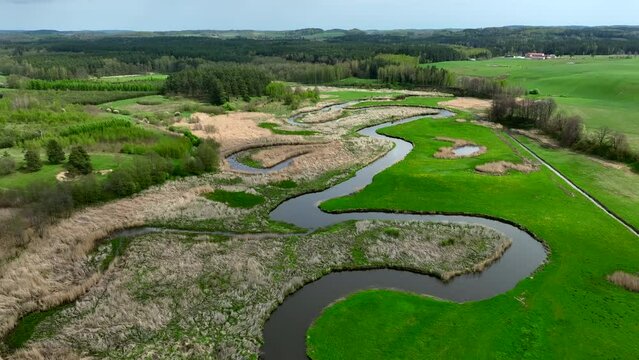 Top view of small river Lyna flowing in Warmia, northern Poland, Europe