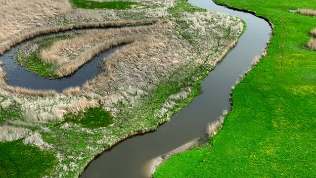 Top view of small river Lyna flowing in Warmia, northern Poland, Europe