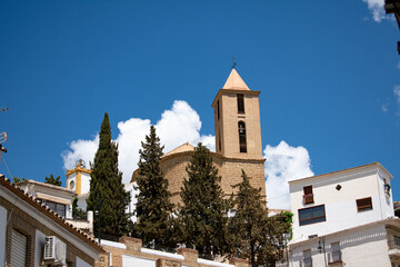 Ancient Christian church in Córdoba, Spain. Catholic church. Religious church. Iznajar, Cordoba, Andalusia, Spain. Exterior view of the church building. 