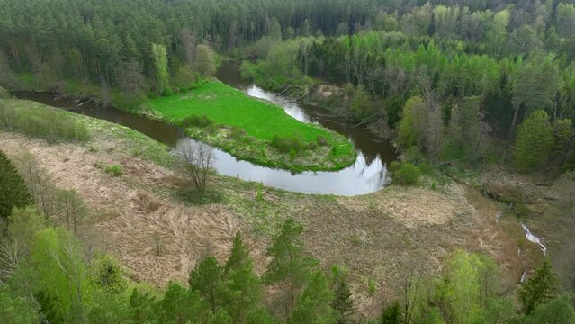 Top view of small river Lyna flowing in Warmia, northern Poland, Europe