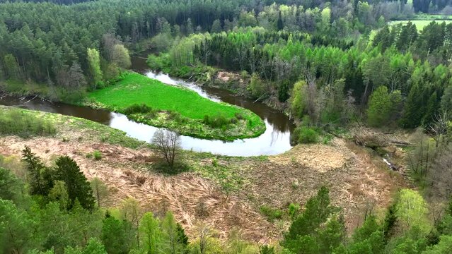 Top view of small river Lyna flowing in Warmia, northern Poland, Europe