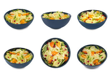 Bowl of delicious salad with Chinese cabbage, lemon, persimmon and pomegranate seeds on white background, different sides