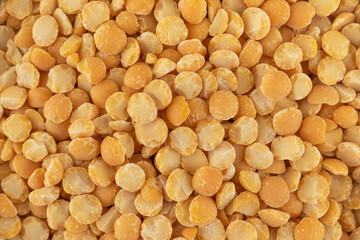 Yellow split dry peas close-up. Vegetable protein. Horizontal photo.