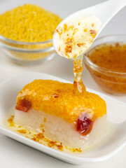 Pastry made of yellow rice(coarse rice), Panicum miliaceum and white sugar,traditional Chinese snack