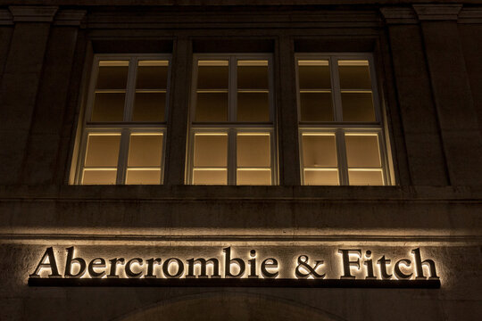 MUNICH, GERMANY - DECEMBER 17, 2017: Abercrombie & Fitch logo on their Munich main shop taken at night. Abercrombie & Fitch is American retailer specialized in Youth wearPicture of the Munich Abercr