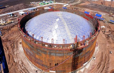 The design of the dome roof mounted on vertical steel tanks for petroleum products.
