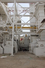 A powerful thermal power plant provides heat and electricity to the whole city.