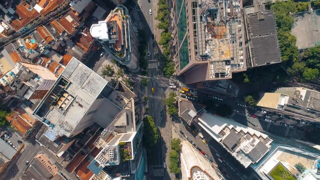 RIO DE JANEIRO, BRASIL - MAY, 2023: Drone aerial view of streets in city centre Gamboa district. Cityscape of a famous historical buildngs in downtown at sunny day with clouds from above.