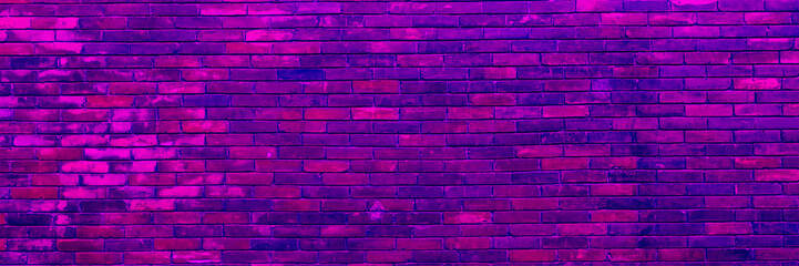 Long Panorama Of Purple Or Lilac Brick Wall With Vignette. Purple Brick Wall As Background To Place Text Or Graffiti. Copy Space And Abstract Web Banner.