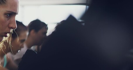 Tired, cycling and fitness with face of woman at gym for workout, weight loss or endurance training. Breathing, sweat and fatigue with girl in spin class for sports, health and cardio challenge