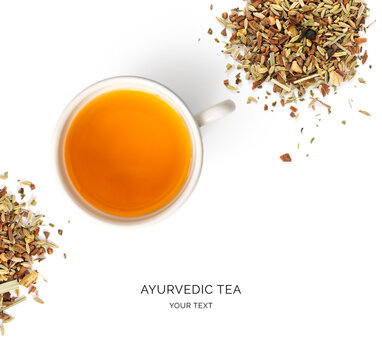 Creative layout made of a cup of tea with Ayurvedic spices  on white background. Flat lay. Food concept. Macro  concept.