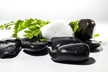 Spa composition  on white background. Stack of spa stones