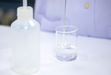 Acid-base reaction titration in Laboratory.