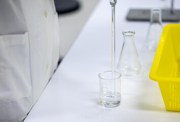Acid-base reaction titration in Laboratory.